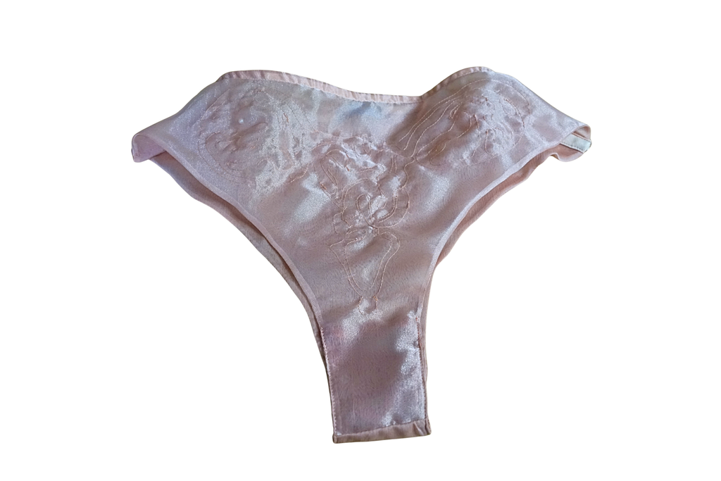 White lace thong on a white background